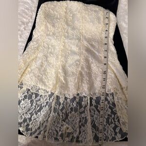 Charlotte Russe cream colored stunning  strapless top. Size S
